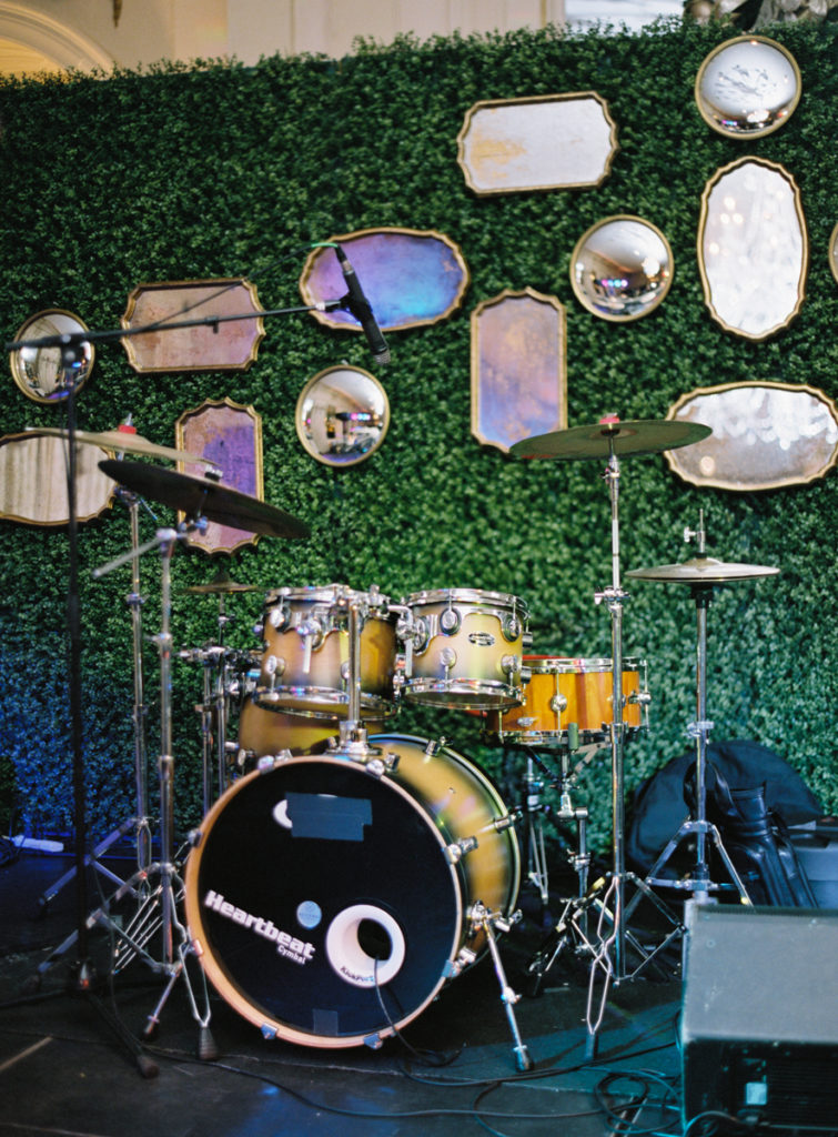 Jackson Durham Events creates mirror wall behind band at wedding reception
