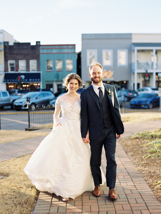 bride and groom get married in central square oxford, mississippi