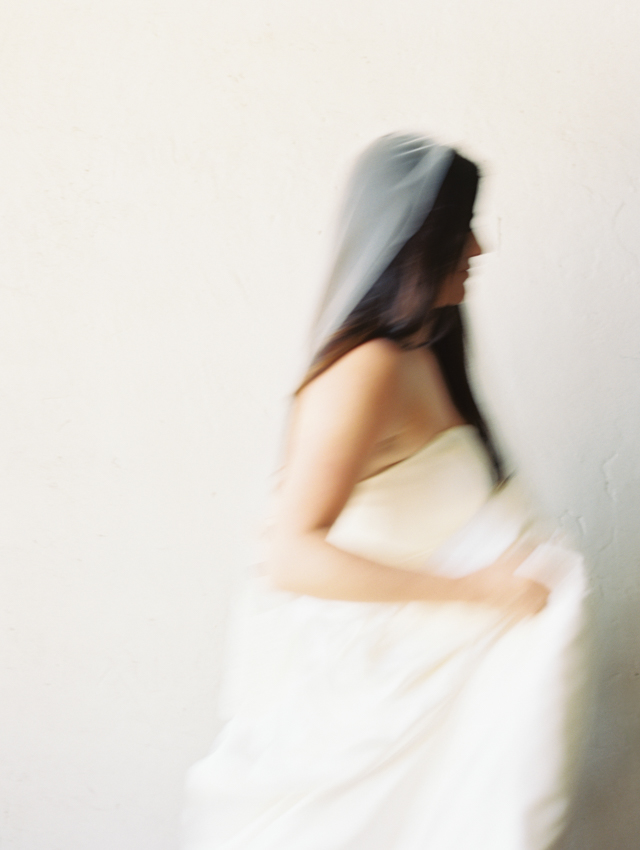 In motion simple bridal portrait with white background shot on film 