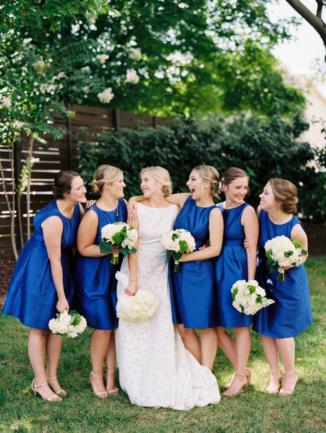 Summer Wedding Inspiration with Bridesmaids wearing all blue short bridesmaid dresses 