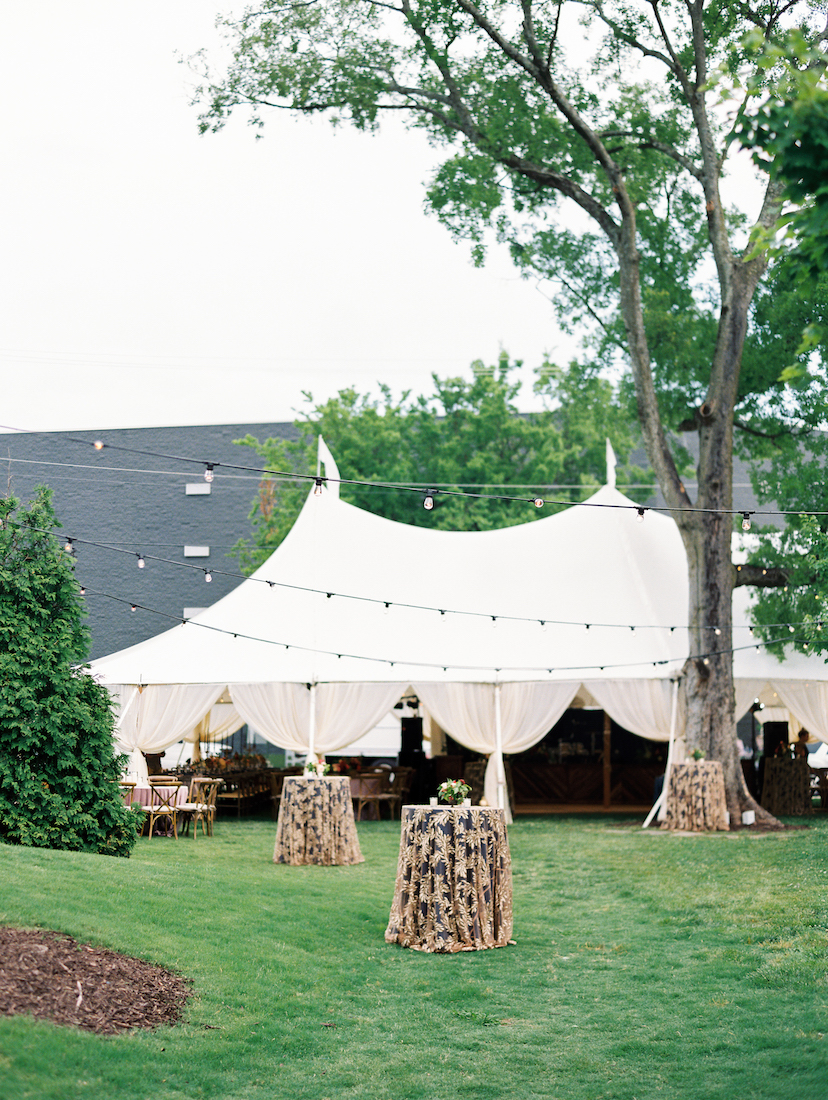 Outdoor tented wedding reception space on the lawn in Chattanooga, TN