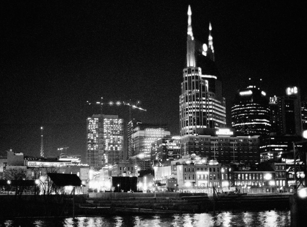 Downtown Nashville at night from The Bridge Building Wedding and Rehearsal Dinner Film Wedding Photographer 
