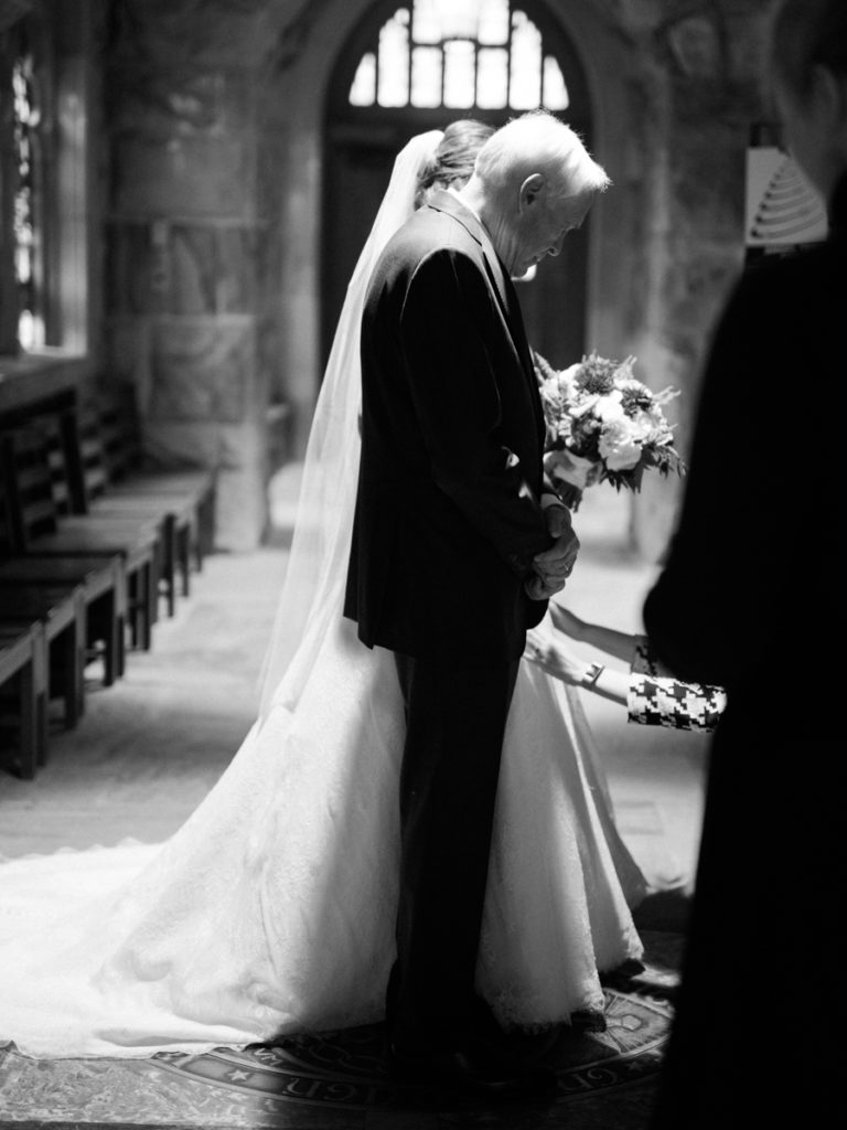 sewanee wedding photographer captures film photograph candid wedding walk down the aisle at church 