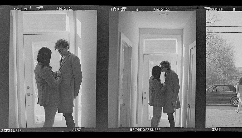 black and white anniversary session in the city featuring a super 8 film